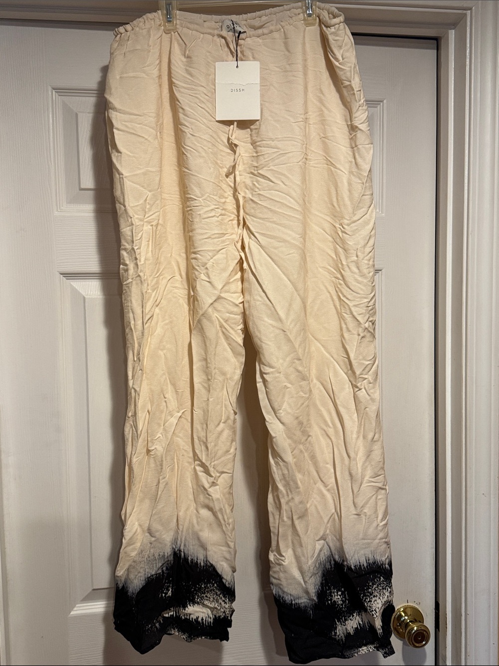 DISSH Cream Wide-Leg Pants and Top with Black Dip-Dye Hem